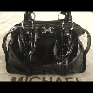 EUC Michael Michael Kors black patent leather satchel with silver hardware.